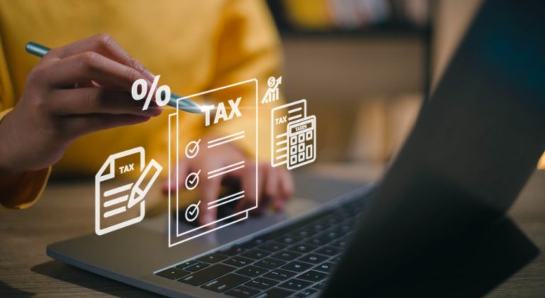 corporate-individual-tax-payment-concept-woman-using-computer-filling-out-corporate-personal-income-tax-return-vat-property-tax-business
