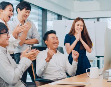 millennial-group-young-businesspeople-asia-businessman-businesswoman-celebrate-giving-five-after-dealing-feeling-happy-signing-contract-agreement-meeting-room-small-modern-office