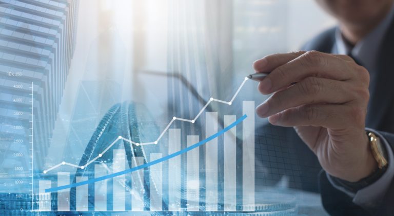 businessman-analyzing-financial-report-with-economic-graph-virtual-screen