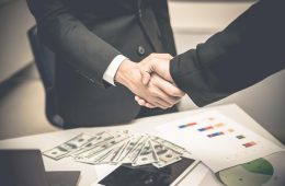asian-business-people-shaking-hands-finishing-up-meetingmission-completetwo-business-people-are-holding-hands-business-cooperation-future