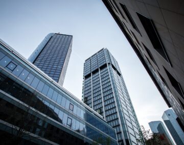 A low angle shot of high rise buildings under the clear sky in Frankfurt, Germany